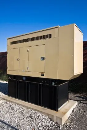 Commercial backup power generator on a concrete equipment pad